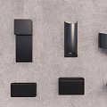 Black Wall Lamps with Various Modern Designs Mounted on Gray Background Wall