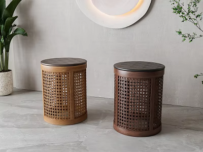 Two Rattan Woven Stools With Light And Dark Brown Bodies And Black Top Surfaces In Modern Interior 3d model