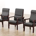 Three Black Leather Office Chairs With Wooden Armrests And Legs For Office Use