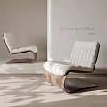 Elegant Modern Lounge Chair With White Padded Design And Walnut Wooden Base In Bright Interior