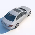White Mercedes Benz Sedan With Modern Exterior Design And Front Grille Headlights