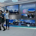 Cultural Center Interior With Visitors Exploring Exhibition Murals Digital Screens And Decorative Flags
