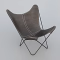 Modern Dark Leather Lounge Chair With Butterfly Design White Stitching And Metal Frame