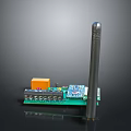 Electronic Green Circuit Board Module With Orange Square Component Blue Chip Long Black Antenna
