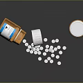 Medical Devices Including Medicine Bottles With Scattered White Tablets And Labels