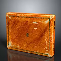 Orange Wooden Stone Box With Green Trim And Rustic Surface Texture