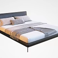 Modern Double Bed With Dark Leather Headboard Gray Pillows And Striped Blanket