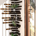 Wooden Multi Tiered Shelf Unit With Plants And Decorative Items Near Window