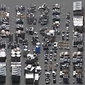 Various Types of Industrial Equipment Models Arranged on Gray Background