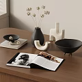 Decorative Ornament Set With Black Vase Dried Flowers White Figurine Black Bowl On Wooden Table