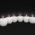 White Lit Candle Lamps With Various Textured Designs For Modern Home Decor