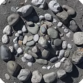 Natural Stone And Wood Decorative Arrangement With Various Sizes On Circular Ground