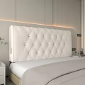 Elegant Modern Bedroom Interior with Beige Tufted Upholstered Headboard Nightstand and Potted Plant