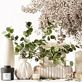 Natural Decorative Ornament Set With Green Eucalyptus Leaves White Blossoms Books Candles And Golden Accents