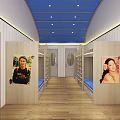 Hotel Guest Room With Bunk Beds Blue Mattresses Wooden Flooring Windows And Blue Sofas