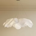 Modern White Petal Shaped Chandelier With Soft Material Shade And Metal Frame Hanging From Ceiling