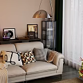 Beige Three Seater Sofa With Decorative Pillows Throw Blanket Floor Lamp And Christmas Tree