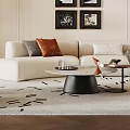 Modern Sofa Coffee Table Set with White Upholstery Gray Brown Pillows Round Marble Top Wall Art