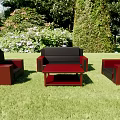 Black and Red Sofa Coffee Table Set on Green Lawn with Lush Greenery and Trees