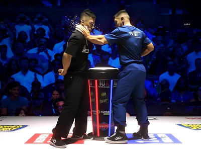 Two Men Competing In Arm Wrestling Match With Crowd Watching On Stage 3d model