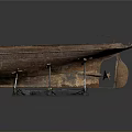 Old Rusted Boat Displayed On Black Metal Stand Against Gray Background