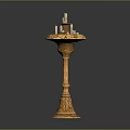Elegant Golden Pedestal Table With Decorative Candles On Top And Intricate Carved Decorations