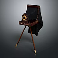 Vintage Electronic Camera On Wooden Tripod Featuring Black Cloth And Brass Parts Design