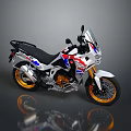 Adventure Motorcycle With Red White Blue Body Gold Wheels Windshield And Black Seat