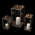 Lit White Candles in Metal Frame Candle Lanterns with Transparent Panels and Greenery