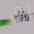 Bicycles Parked On Colorful Racks With Green Yellow Red Metal Structures