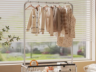 Metal Clothes Rack Holding Light Colored Clothes With Storage Basket And Plant By Window 3d model