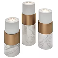 Wall Decor Candle Holders With White Candles Gold Accents And Marble Pattern Bases