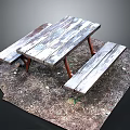 Weathered Wooden Picnic Table With Benches On Outdoor Dirt And Gravel Ground