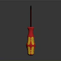 Household Screwdriver With Red And Yellow Ergonomic Handle And Metal Shaft