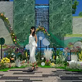 Floral Installation With Woman In White Dress Green Marble Waterfall Colorful Flowers And Curved Arch