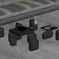 Modern Glass Coffee Table With Black Cylindrical Legs Black Tray Glass Cups Bottle And Magazine