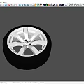 Car Tire With Silver Alloy Rim And Stylish Tread Pattern Design