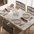 Marble Top Dining Table Set With Rattan Chairs Plates Cutlery Fruits And Dried Flowers