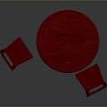 Red Round Dining Table With Two Red Chairs In Dark Background