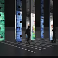 Modern Exhibition Hall Design Columns With Digital Display Panels And Visitors Observing 3d model