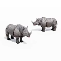 Two Lifelike Gray Textured Rhinoceros Sculptures Standing On White Background