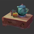 Green Ceramic Teapot and Cup with Red Apple on Wooden Table with Tablecloth