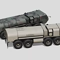Two Large Military Tanker Trucks With Beige And Camouflage Truck Exterior Design