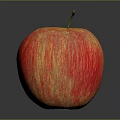 Fresh Shiny Red Apple With Yellow Stripes On Dark Reflective Surface