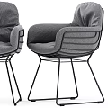 Modern Soft Gray Fabric Upholstered Armchair With Stylish Metal Wire Frame For Cozy Dining Spaces
