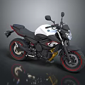 Modern White and Black Motorcycle with Red Rimmed Wheels Golden Shock Absorbers and Black Seat