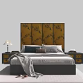 Double Bed With Yellow Headboard Black Floral Patterns Nightstands Table Lamp Pillows And Blanket