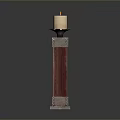 Elegant Candle Holder With Red Wooden Column And Metal Accents Holding Lit Candle