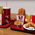 KFC Fast Food Assortment with Fries Drink Breadsticks Ketchup Mustard Pepsi Can and Croissant