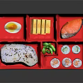 Colorful Sushi Bento Box With Fresh Sashimi Rolls Egg And Cheese Sticks